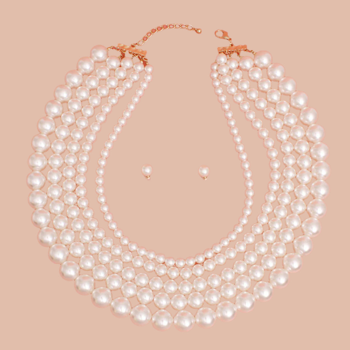 Women's Pearl Necklace Set Luxe Statement 5 Strand Acrylic Cream Pearl Necklace. Multistrand Necklace Features Graduated Pearl Strands from 9mm to 18mm. Layers measure 22" to 28". Gold Metal Lobster Clasp Closure. Includes Matching Pearl Ball Stud Post Backing Earrings.